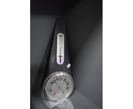 A metal cased barometer having a metal tear drop design case