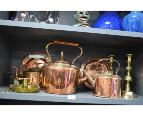 A good assortment of vintage and antique copper and brass ware including large kettle, candle stick holders and more.