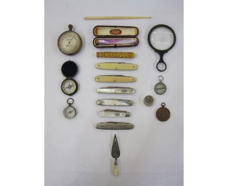 F Barker & Son compensated pocket barometer, a small brass compass in leather and velvet-lined case, two other compasses, a m