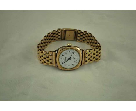 A Precista 9ct gold gentleman's Wristwatch on gate link 9ct strap 33g (42.5g gross)