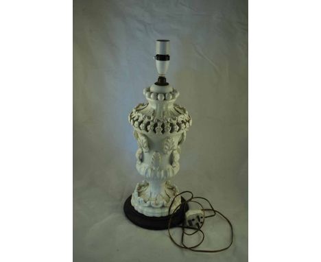 A mid to late 20th century white ceramic Lamp Base with pierced and applied decoration, 46cm high