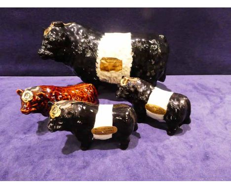 A Rutherfords Scotch Whisky Decanter in the form of a Belted Gallowy Bull, 70cl unopened and three miniature Bulls, each 5cl,