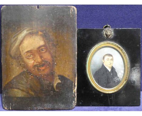 A 19th century French Portrait Miniature of a Gentleman in black jacket and waistcoat, an oval ivory panel, set into black la