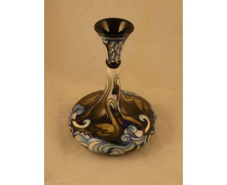 A Moorcroft Pottery limited edition knop necked ships decanter form vase in the Waddesdon Waters (Black Swan) pattern by Emma