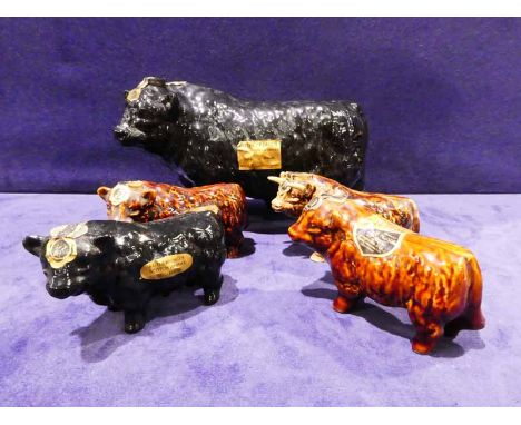 A Rutherfords Scotch Whisky Decanter in the form of a Black Galloway Bull, 70cl unopened and four Miniature Bulls, each 5cl u