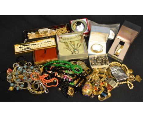 Jewellery - a carved Chinese stone lucky dragons bangle; others, plain; beads, a coral style pink graduated single strand bea
