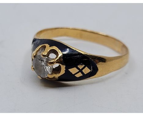 An Indian precious yellow metal, blue enamel and diamond ring, set single round brilliant cut diamond to centre with dark blu