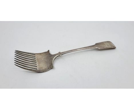 A George III Irish silver fiddle pattern fork, by Richard Whitford, Dublin 1813, nine tine, stamped for retailer "M.West", le