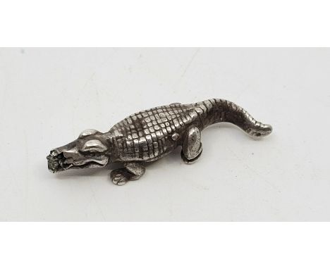 Antiquities: An Egyptian miniature silver crocodile amulet, possibly early to middle Roman period 30BC - 323AD, with cross-ha