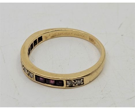 An 18ct. gold, ruby and diamond half hoop ring, pave set seven round cut diamonds and channel set six rectangular cut rubies,