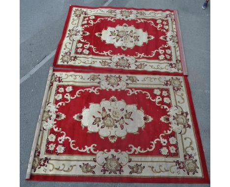 A pair of vintage 20th century Persian Islamic carpet floor rug having a red background with central floral medallion set wit