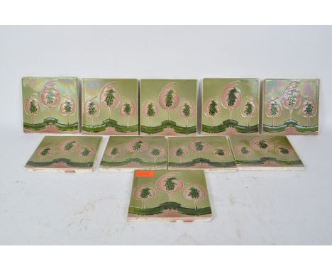 A set of ten 19th century Victorian ceramic tile panels, each being decorated with pink flowers upon a green ground. Measures