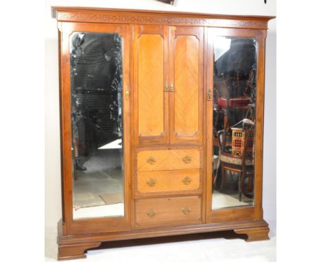 Edwardian mahogany triple wardrobe compactum. Raised on bracket feet base with linen cupboard over chest of drawers to centre