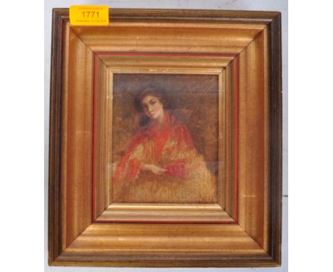 An early 20th century oil on board portrait to depict a female sitter with Pre-Raphaelite influence wearing a red and yellow 