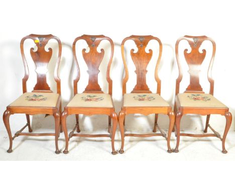 A set of 4 Edwardian Queen Anne solid mahogany dining chairs. Each raised on cabriole legs with good pad feet united by h-str