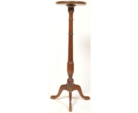 A Victorian 19th century mahogany tripod jardiniere / plant stand / torchere. The planter having a raised edge to the platter