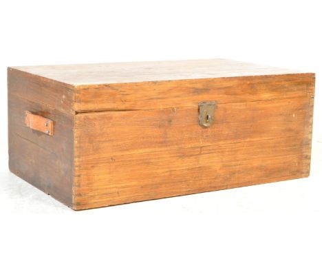 An early 20th century camphor wood trunk chest of rectangular with leather straps to each side.&nbsp;Measures approx. 33cm x 