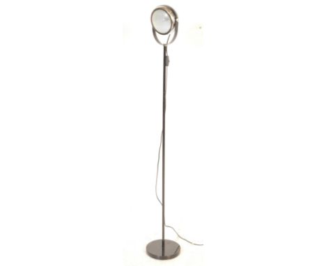 A contemporary 21st century floor standard lamp - car lamp. Raised on chrome base with ebonised upright having a vintage car 