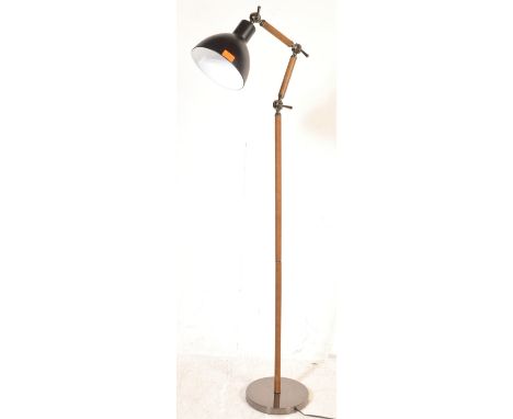 A contemporary anglepoise style - manner of Herbert Terry standard floor lamp. Black colourway with terraced base, tall colum