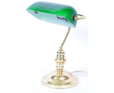 A vintage retro mid 20th century office bankers lamp having a brass base with green glass rectangular shade.&nbsp;