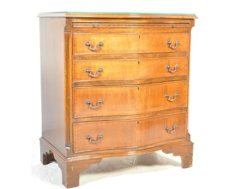 A 19th century George III revival mahogany serpentine fronted kneehole bachelors chest of drawers. Raised on bracket feet wit
