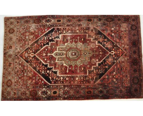 A mid 20th century Iranian / Persian Islamic Goltoch thick pile highland wool on cotton rug carpet having silk detailing with