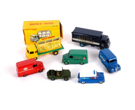 7 Dinky Toys. A French Dinky Simca Cargo glass lorry (33c) In yellow and green Saint Gobain livery, boxed, one outer end flap