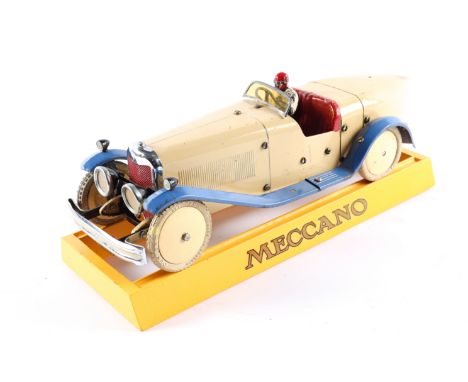 A rare 1930's No.2 Meccano Constructor Car. A boat tail example in cream with blue mudguards, red seat, cream wheels with whi