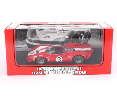 A 1:18 scale GMP 1966 John Surtees No. 3 Team Surtees Lola Spyder. Number 017 of 2504 examples. Signed by John Surtees and Er