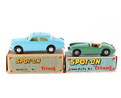 2 Spot-On. A Volvo 122.S (216). An example in light blue with cream interior, VYD 131 number plates, black rubber tyres.  Box