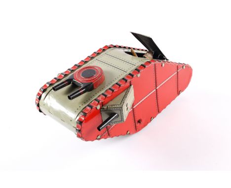 A MARX tinplate clockwork WWI style 'Male' tank. Finished in light grey and red with black detailing, circular action with so