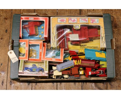 A collection of Britains farm related models and attachments. 9570 Massey Ferguson Combine Harvester, 9571 Farm Land Rover in