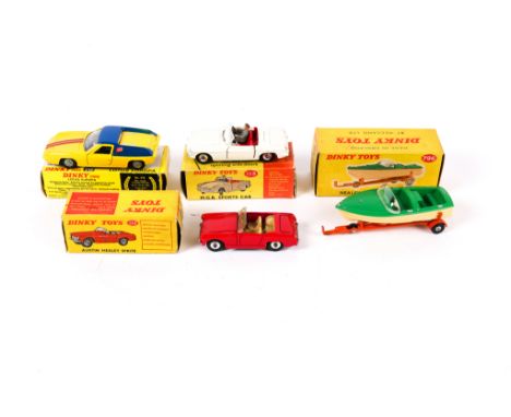 4 Dinky Toys. Lotus Europa (218), in yellow and blue, with black interior. MGB Sports car (113), in white with red interior, 