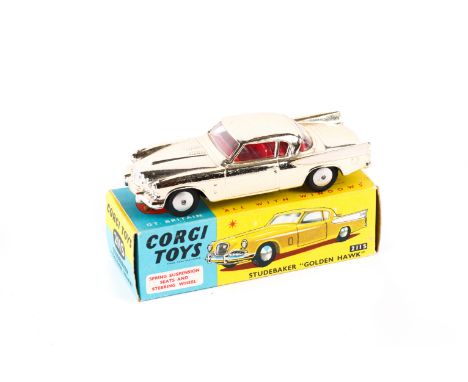 Corgi Toys Studebaker Golden Hawk (211S). In vacuum plated gold with white flash and red interior, smooth spun wheels with bl