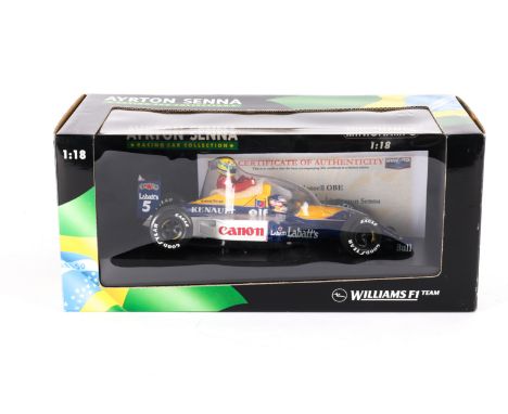A 1:18 scale Minichamps Nigel Mansell signed Williams FW14 1991 with Ayton Senna. Signed by Nigel Mansell, with certificate f