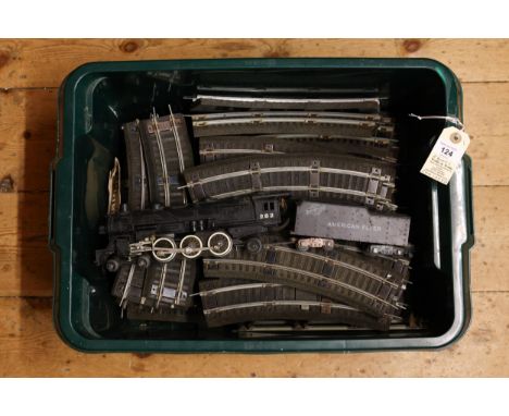 A quantity of 2 rail American Flyer S Gauge Railroad items of rolling stock etc. A 4-6-2 tender locomotive, 282 in plain blac