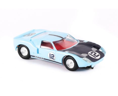 A scarce Scalextric Ford GT 40 in light blue. Has decals No.12 on doors, bonnet and boot, This is probably a sample or could 
