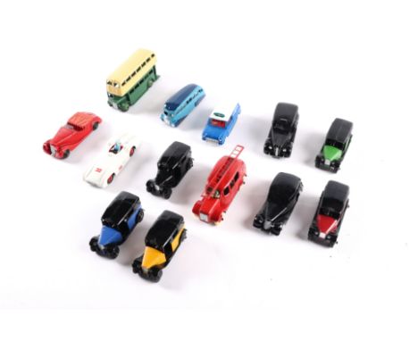 13 well restored early Dinky Toys. A Leyland Double Deck Bus, Austin FX3 TAXI, Streamlined Fire Engine, Mercedes Benz Racing 
