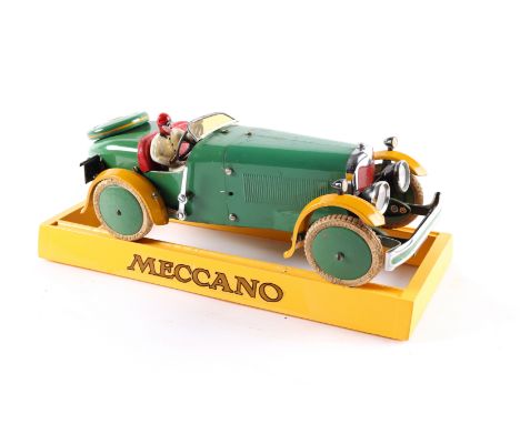 A rare 1930's No.2 Meccano Constructor Car. A round tail example in green with yellow mudguards, red seat, green wheels with 
