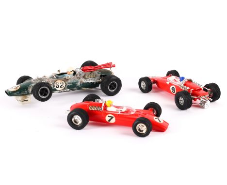 A scarce Scalextric super 124 Lotus F1 car  in green with  No.82 decals with driver in light blue with white helmet. looks co