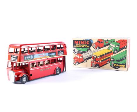 A Post War Tri-ang Minic clockwork powered double decker bus 60M IV. An example in red London Transport livery, with FROG PEN