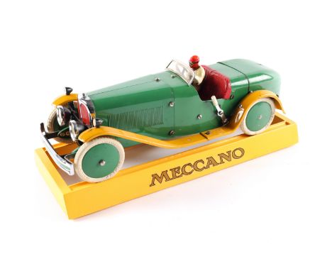 A rare 1930's No.2 Meccano Constructor Car. A long body round tail example in green with yellow mudguards/running boards, red