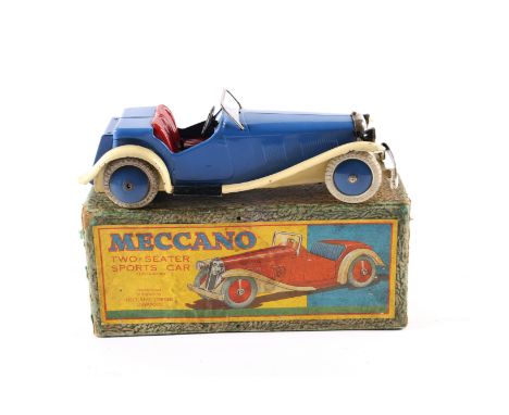 A scarce 1930's Non Constructor Meccano Two-Seater Sports Car. An example in blue with red seats, cream mudguards and running