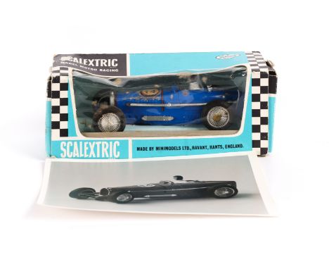 An extremely scarce Scalextric 1934 Bugatti in blue with driver. Contained in its original slide out window box with paperwor