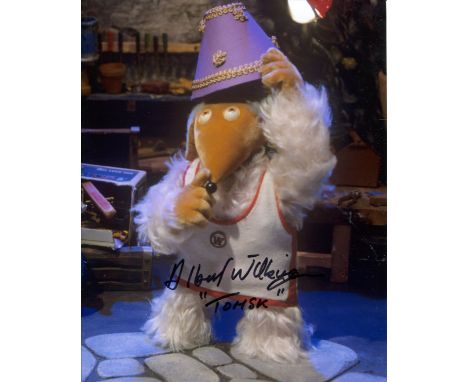 The Wombles. 8x10 inch photo signed by Albert Wilkinson as 'Tomsk' from the Tv series The Wombles. Good Condition. All autogr