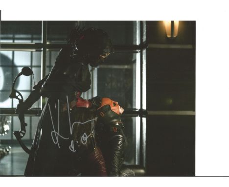 Blowout Sale! Katrina Law Arrow hand signed 10x8 photo. This beautiful hand signed photo depicts Katrina Law as Nyssa al Ghul