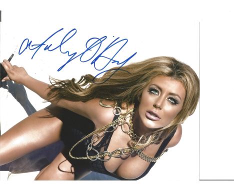 Blowout Sale! Aubrey O'Day Playboy Model / Singer hand signed 10x8 photo. This beautiful hand-signed photo depicts Aubrey O'D