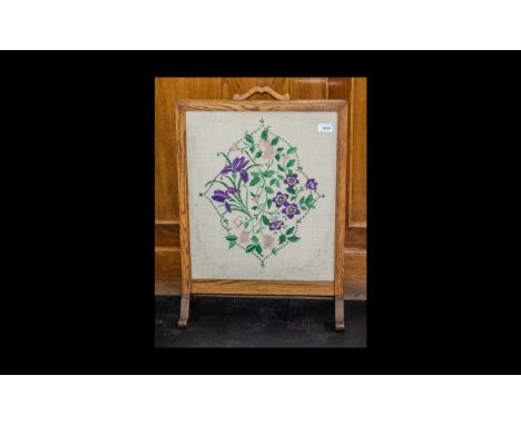 Wooden Framed Tapestry Fire Screen with floral tapestry design to front.  Measures 18" x 25".  Please see photograph.
