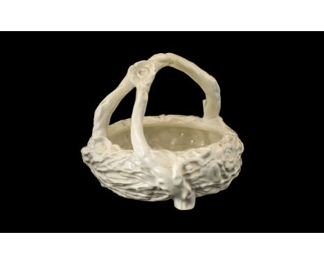 Royal Worcester Mid 19th Century White Porcelain Basket.  Marked to base, 7'' tall x 8'' width.  Minor nick to handle, please