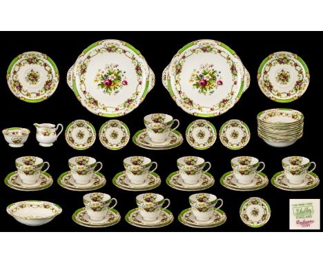 Shelley 'Dubarry' Tea Service No. 13396, Bone China set comprising milk jug 3.5" tall, sugar bowl, 11 teacups, 11 saucers, 12